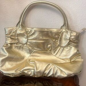 A new golden handbag by Hobo